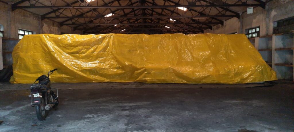 COVERING OF CARGO USING TARPAULIN