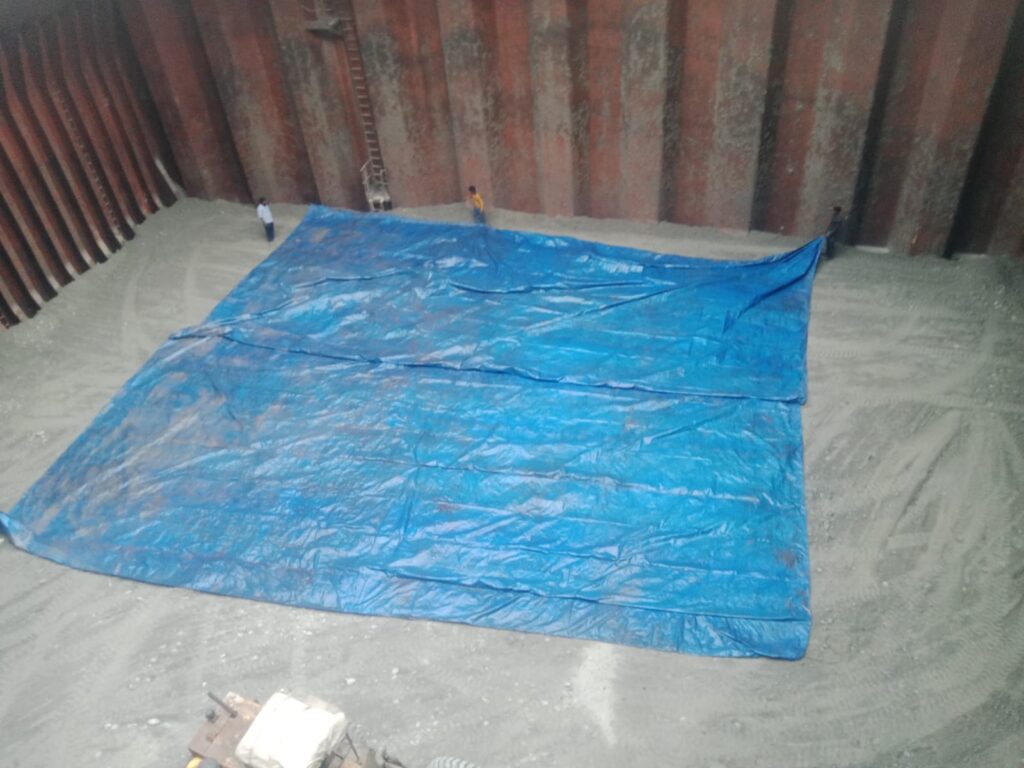 PUTTING TARPAULIN INSIDE HATCH